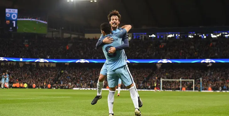 Manchester City's German midfielder Ilkay Gundogan (R) celebrates with Manchester City's Spanish midfielder David Silva after scoring his team's first goal during the UEFA Champions League group C football match between Manchester City and Barcelona at the Etihad Stadium in Manchester, north west England on November 1, 2016. / AFP / PAUL ELLIS (Photo credit should read PAUL ELLIS/AFP/Getty Images)